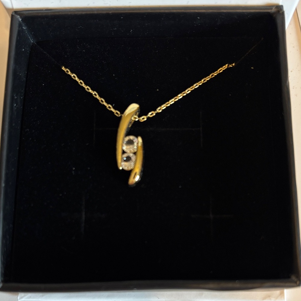 Chloe Gold-Tone Curved Pendant Necklace with Crystal Detail